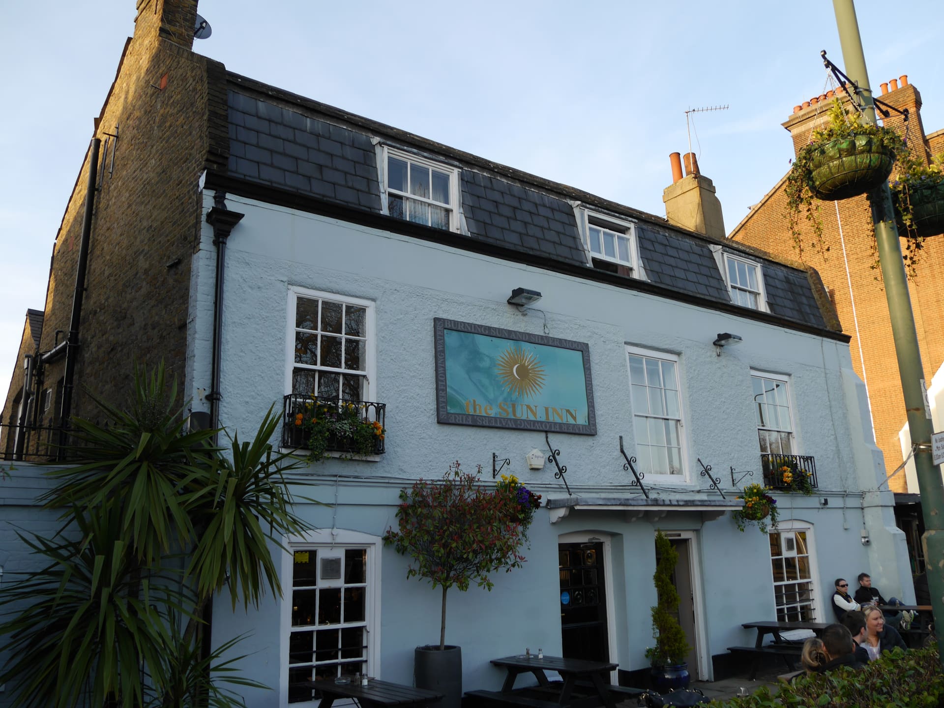 The painted frontage of the Sun Inn in Barnes village.