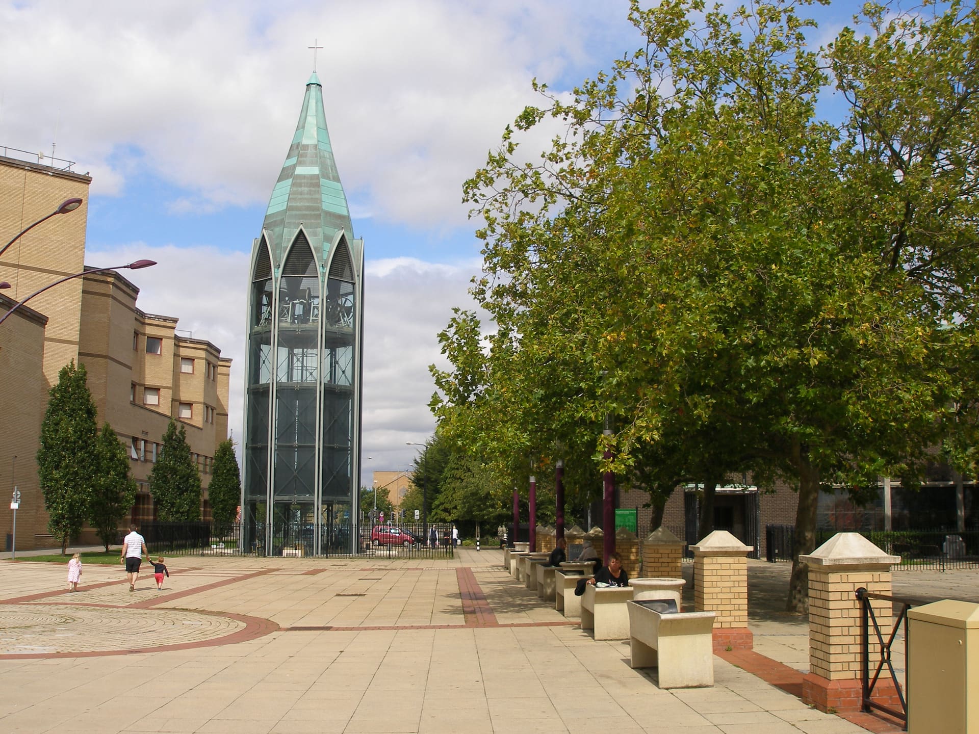 The copper-clad bell tower of St Martin's rising over Basildon town square.