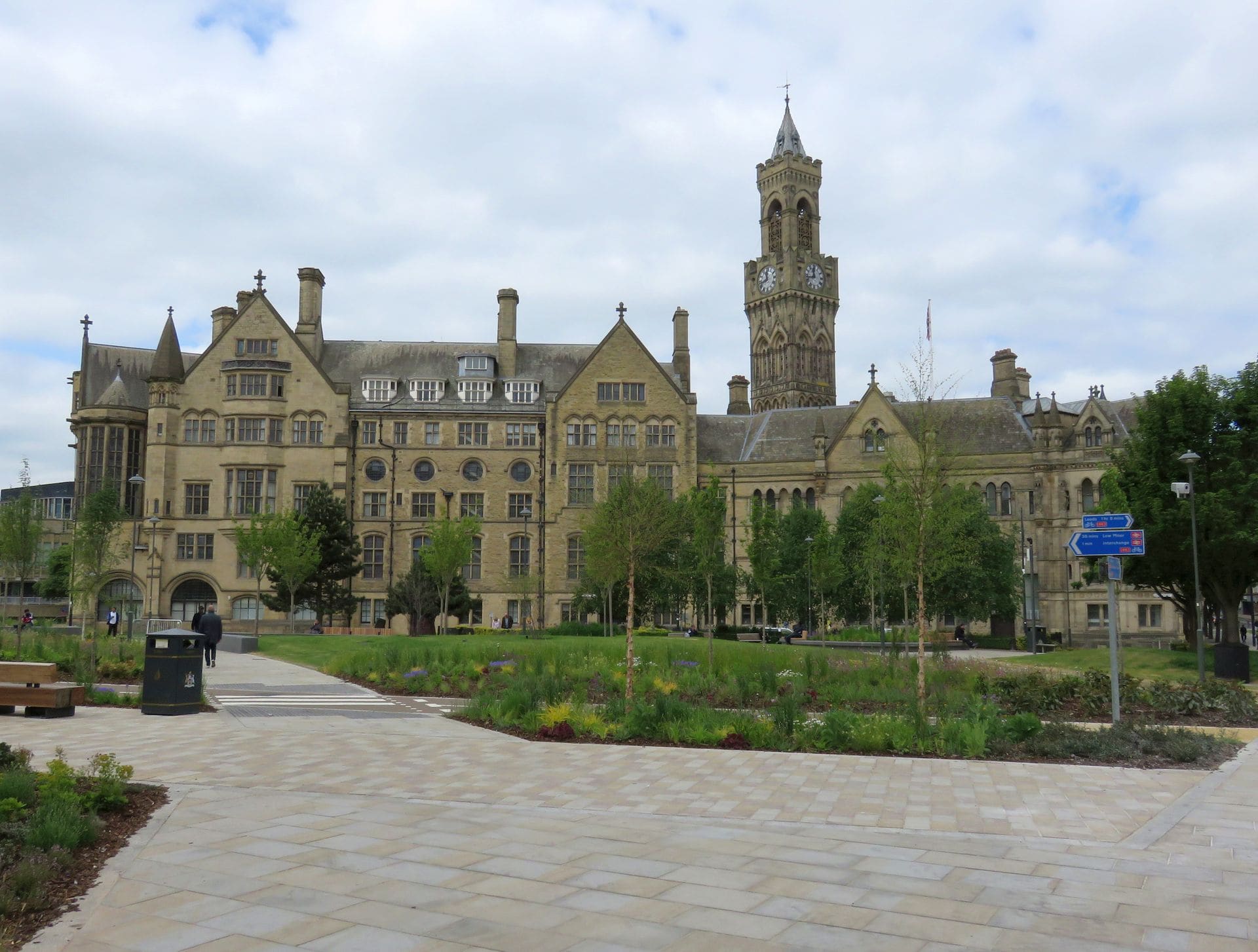 Bradford City Hall's tower above the gardens of Centenary Square.