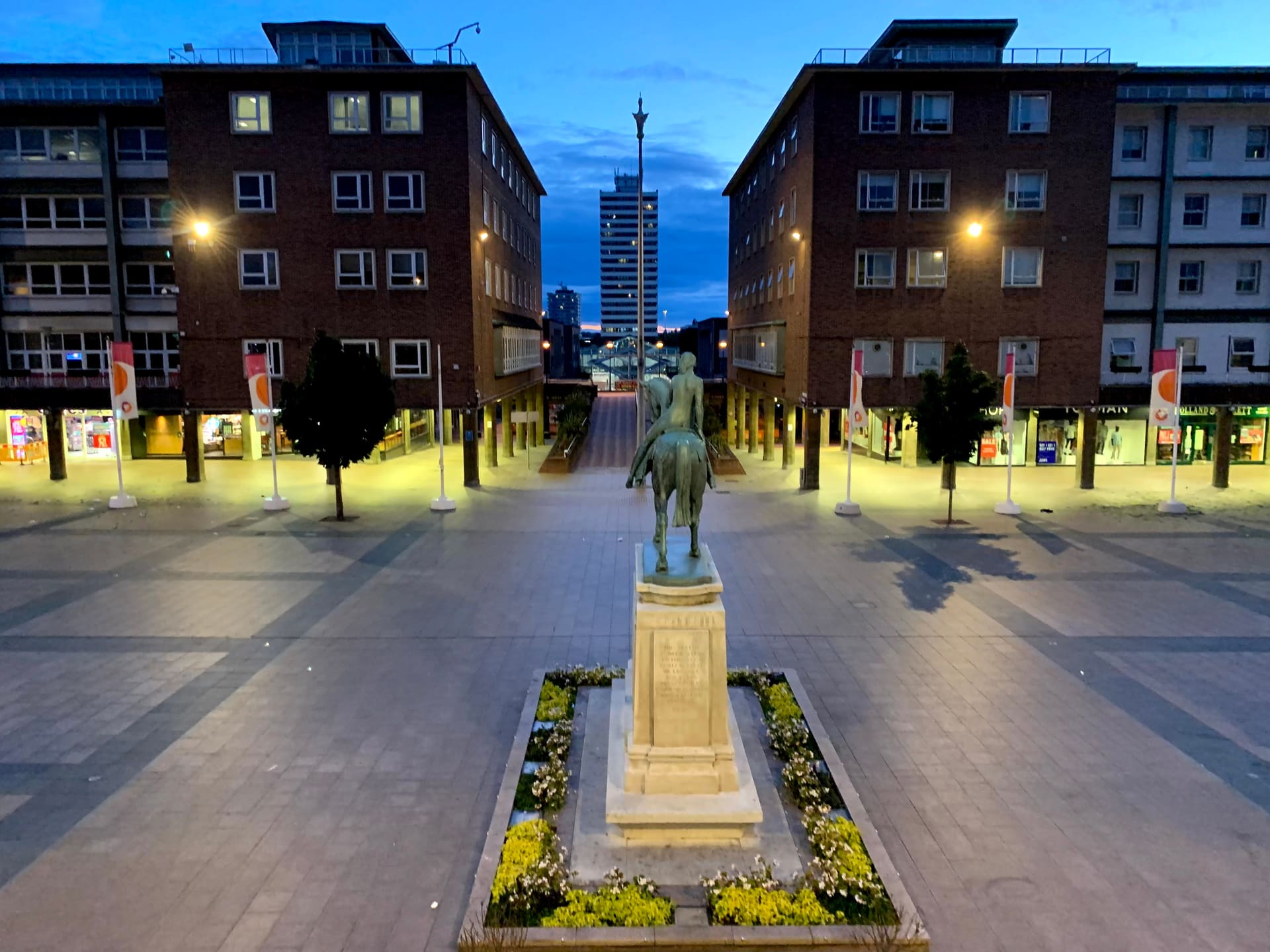 The Lady Godiva statue in Broadgate Square, Coventry, at dusk.