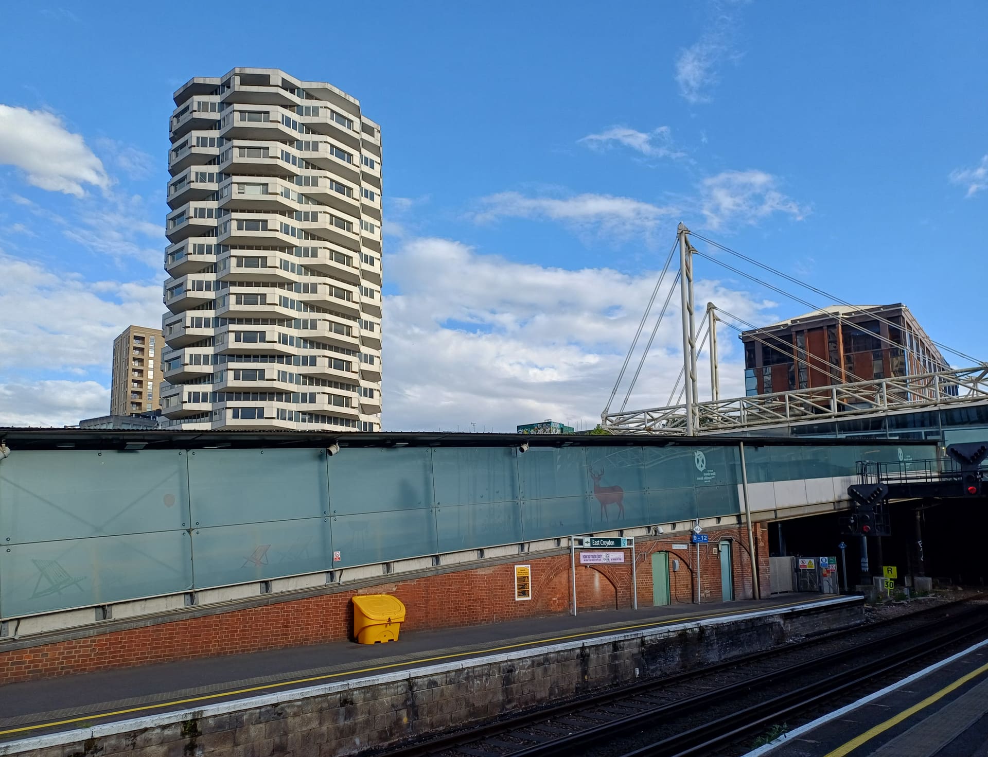 The cylindrical tower of No. 1 Croydon above East Croydon station.