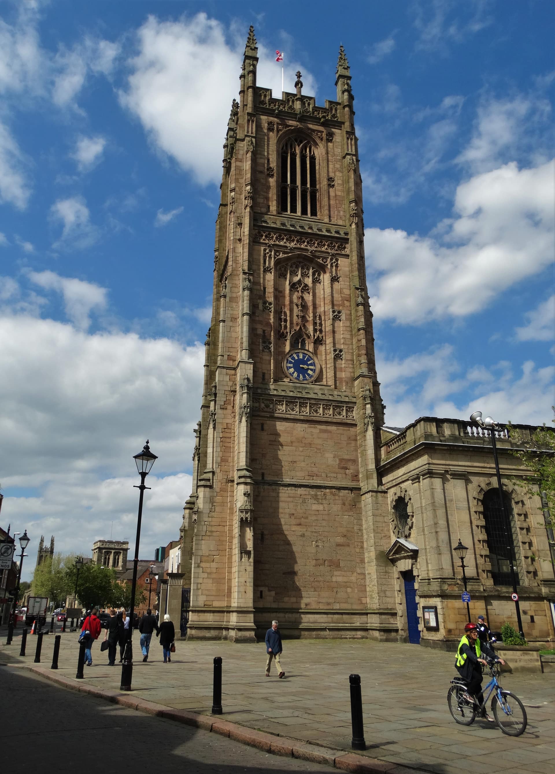 The perpendicular tower of Derby Cathedral above the rooftops.