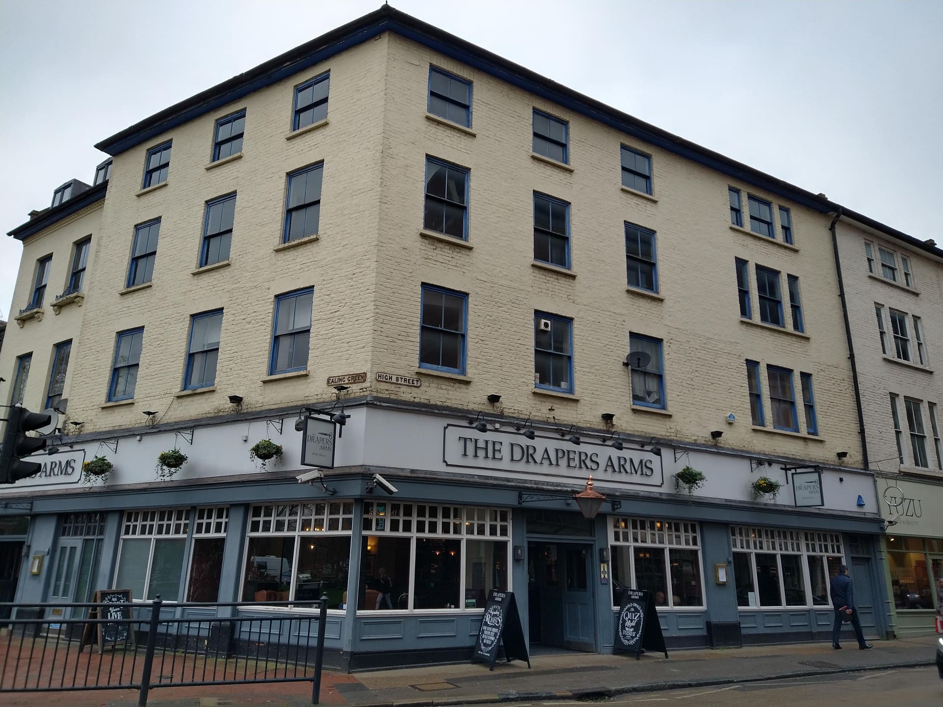The painted corner frontage of the Drapers Arms in Ealing.