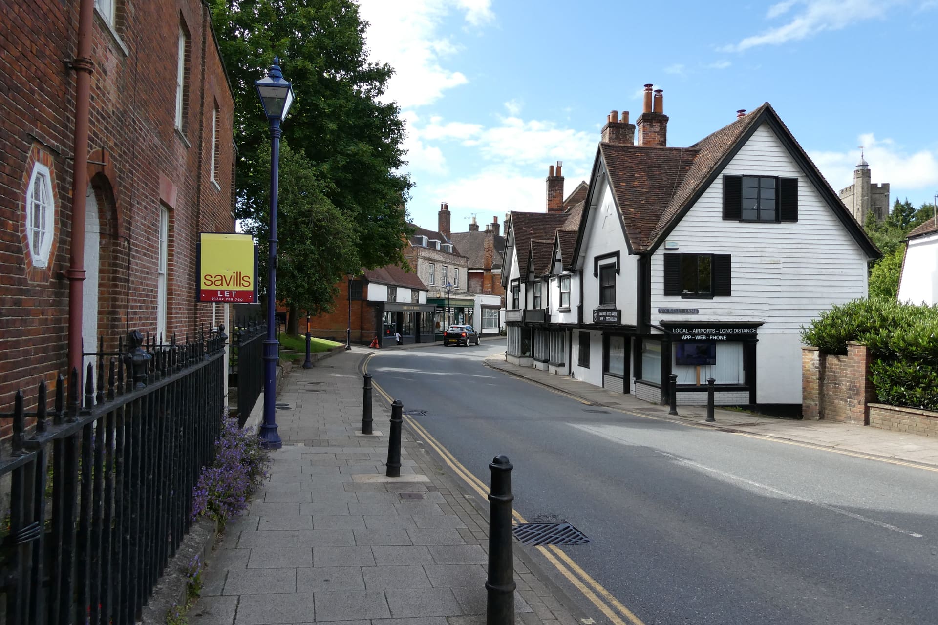 Weatherboarded and jettied frontages on Sevenoaks High Street.