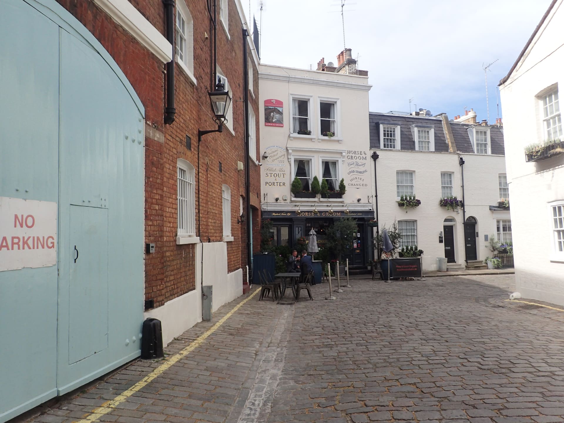 The cobbles and painted cottages of Groom Place mews in Belgravia.