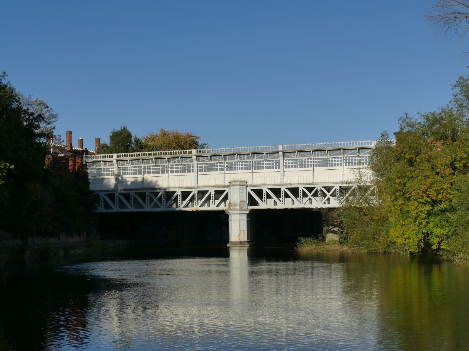 The station bridge at Shrewsbury reflected in the River Severn.